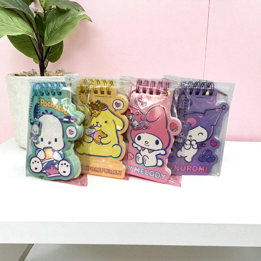 Mini libreta sanrio con llavero